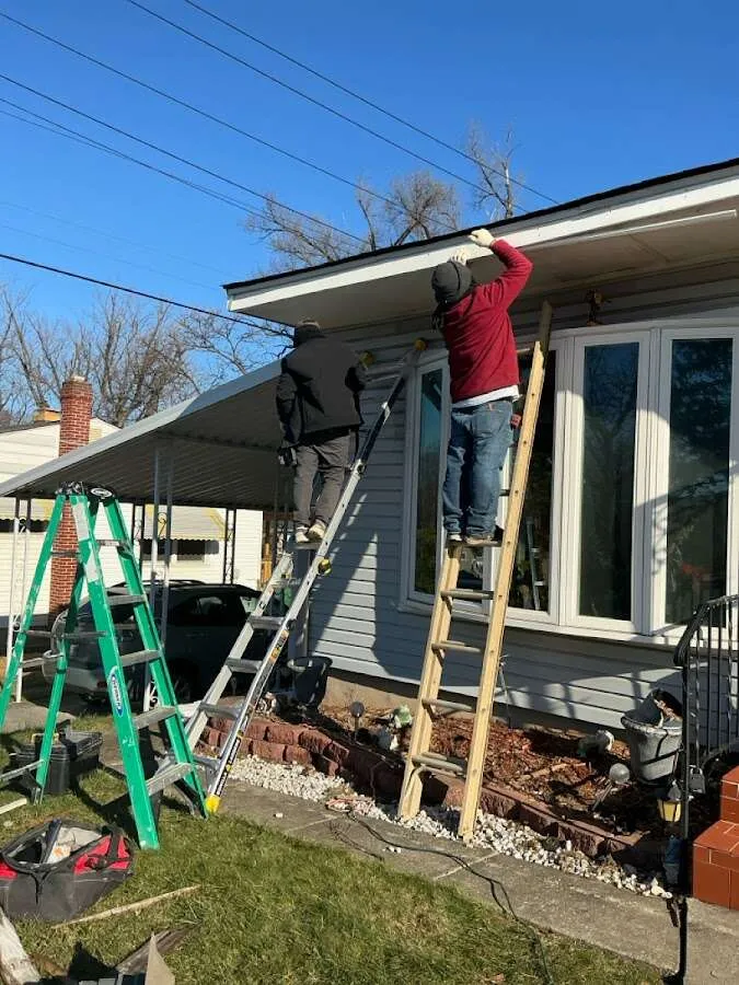 Restoration crew performing exterior repair in Ishpeming