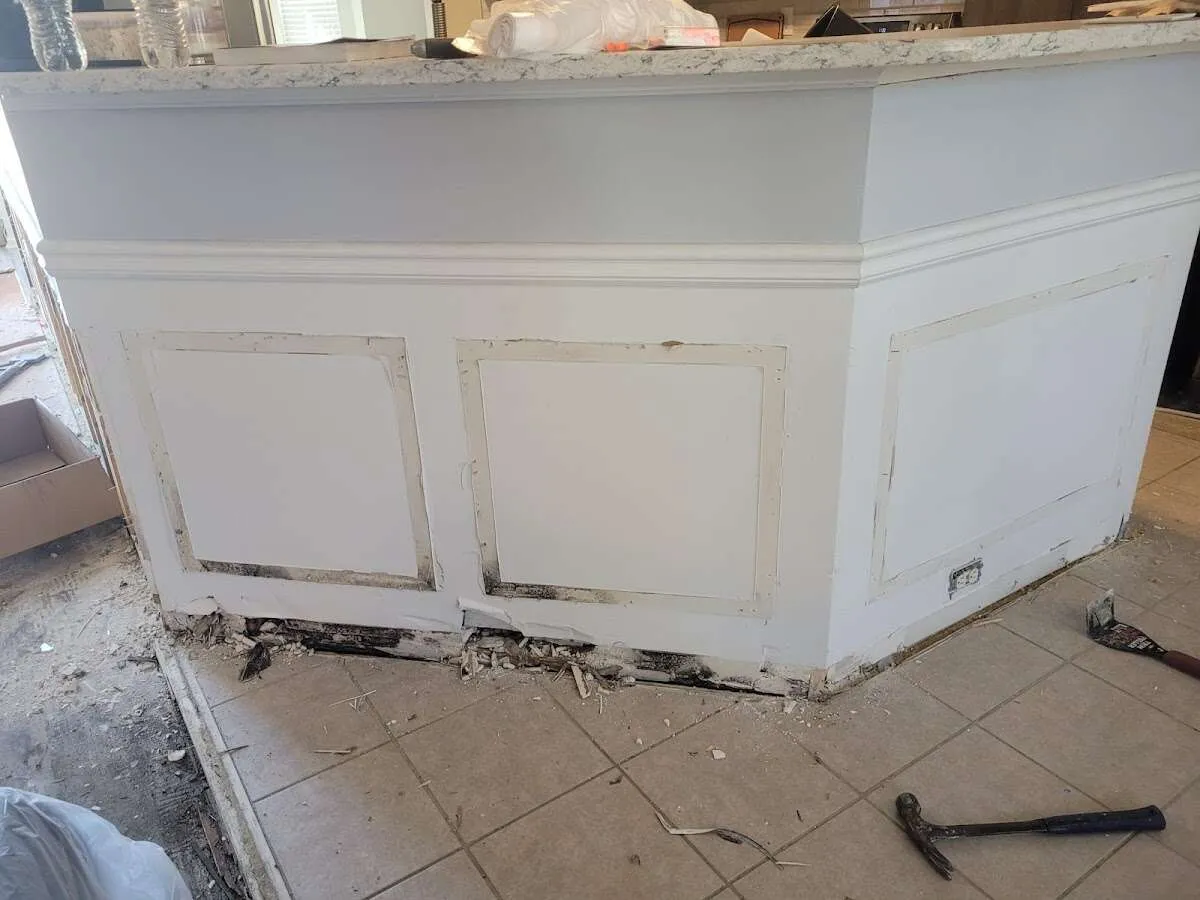 Water damage and mold on kitchen during Storm Damage Restoration in Ishpeming